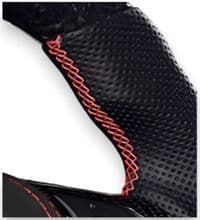 Close-up of premium steering wheel stitching in multiple thread colours